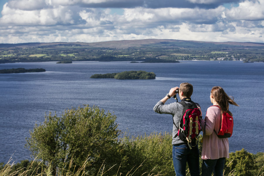 Couple enjoying a spectacular view overlooking Lough Derg